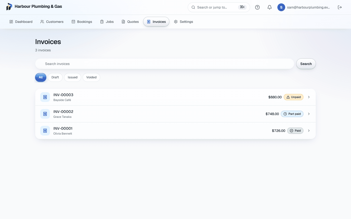 The invoice list, with one invoice paid, one part paid and one unpaid.